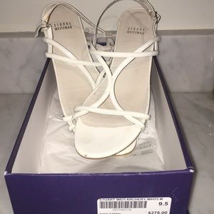 Stuart Weitzman white sandals.